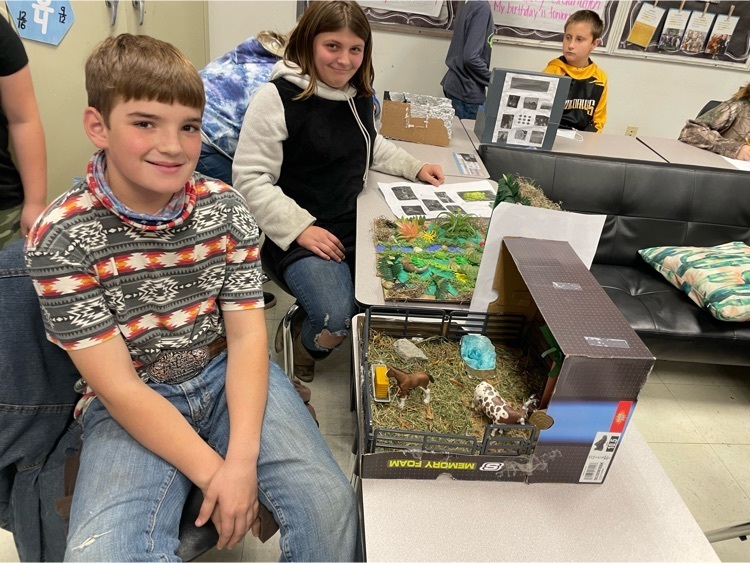 5th grade students with their ecosystem projects for Science