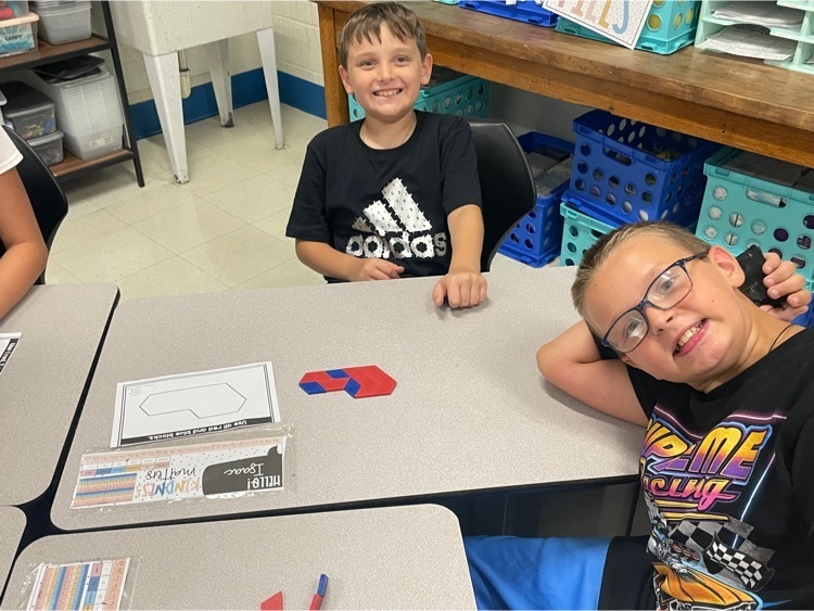 5th grade uses pattern blocks to work on teamwork skills